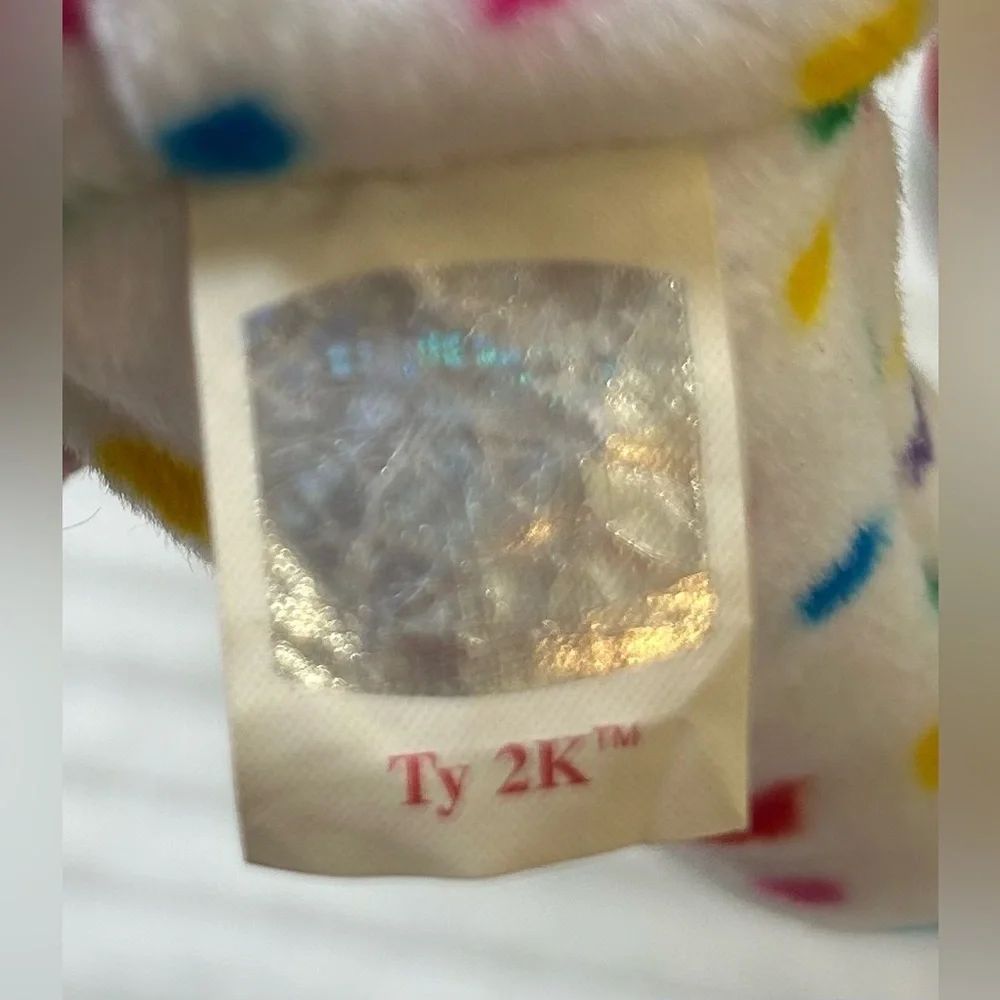 Retired, Vintage and Rare Ty Y2K Confetti Bear Beanie Baby with Errors.